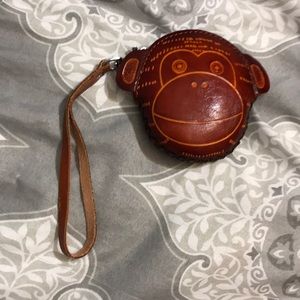 Carved leather monkey coin purse